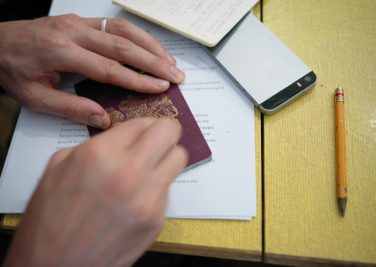 David Blackmore: National emblem being removed from a passport during EUROPEAN PA55PORT at MOCA London October 2018